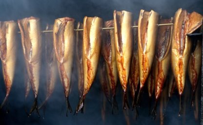 A garden smokehouse is the place to prepare not only meat or fish